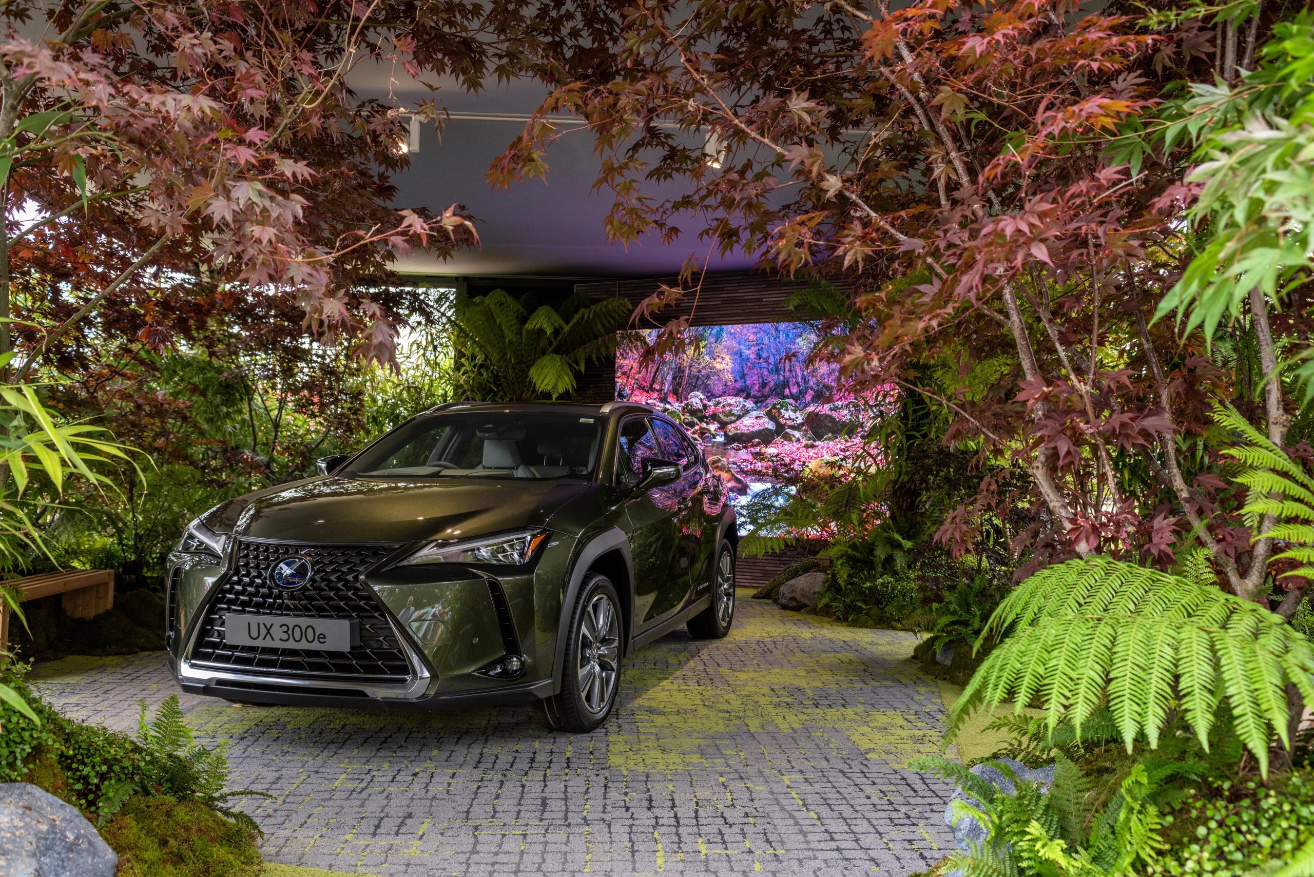 A captivating product shot of a brand new Lexus model car showcased in a brand activation set styled as a Japanese garden. The image exudes elegance and sophistication, capturing the essence of the event, expertly documented by Wright Content.