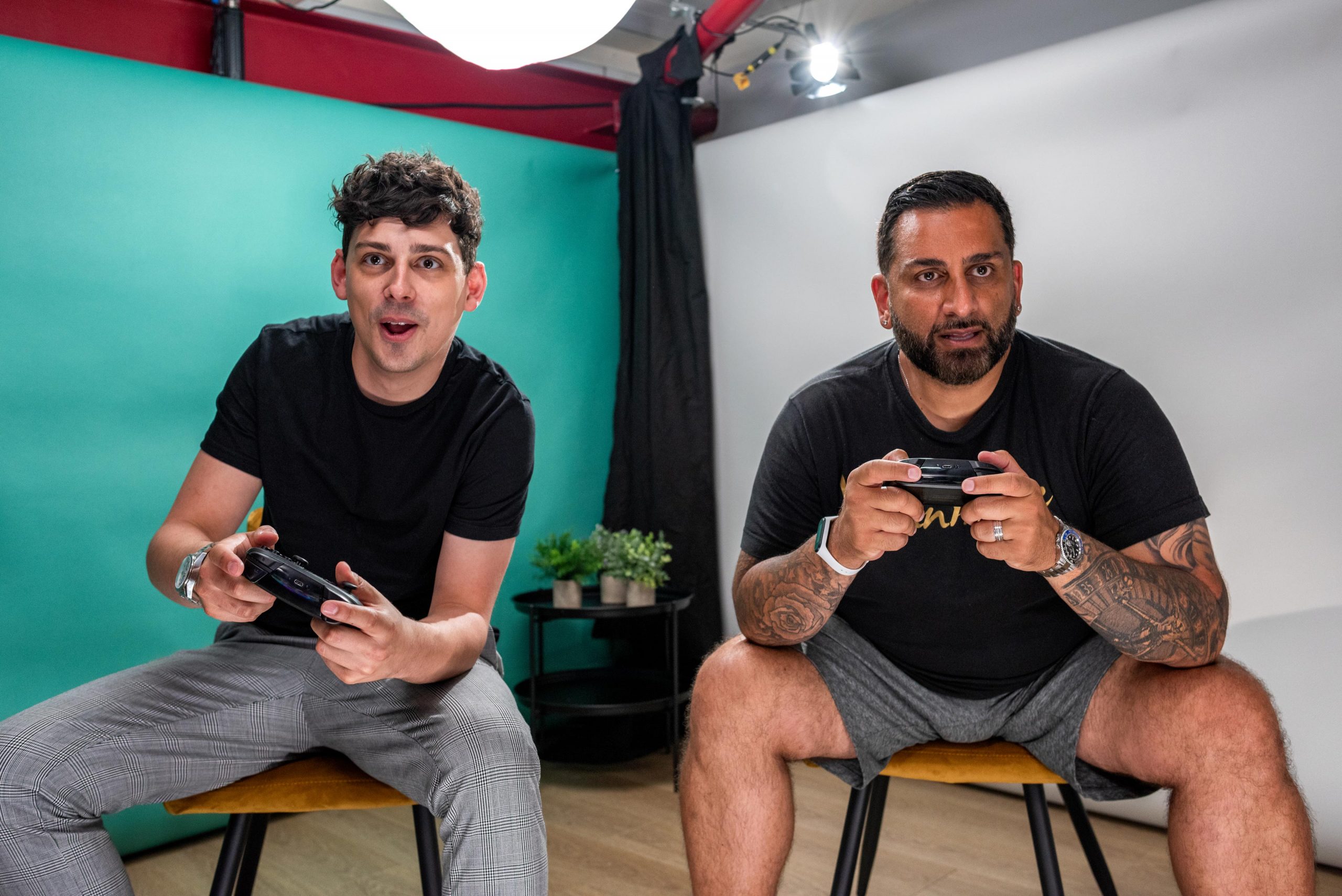 Image depicting two social media stars playing on a games console. It's a reportage shot for a TV program still unit shoot for a production company, captured by Wright Content, a leading portrait photographer in London.
